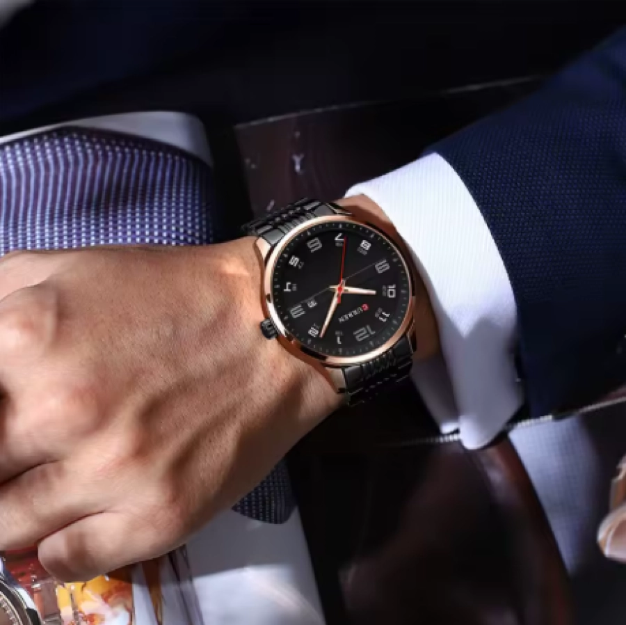 https://hidzo.nl/storage/cache/7753/042750ffec60156258ca171d5f8aeae0/Curren%20horloge%20zwart%20pols.webp
